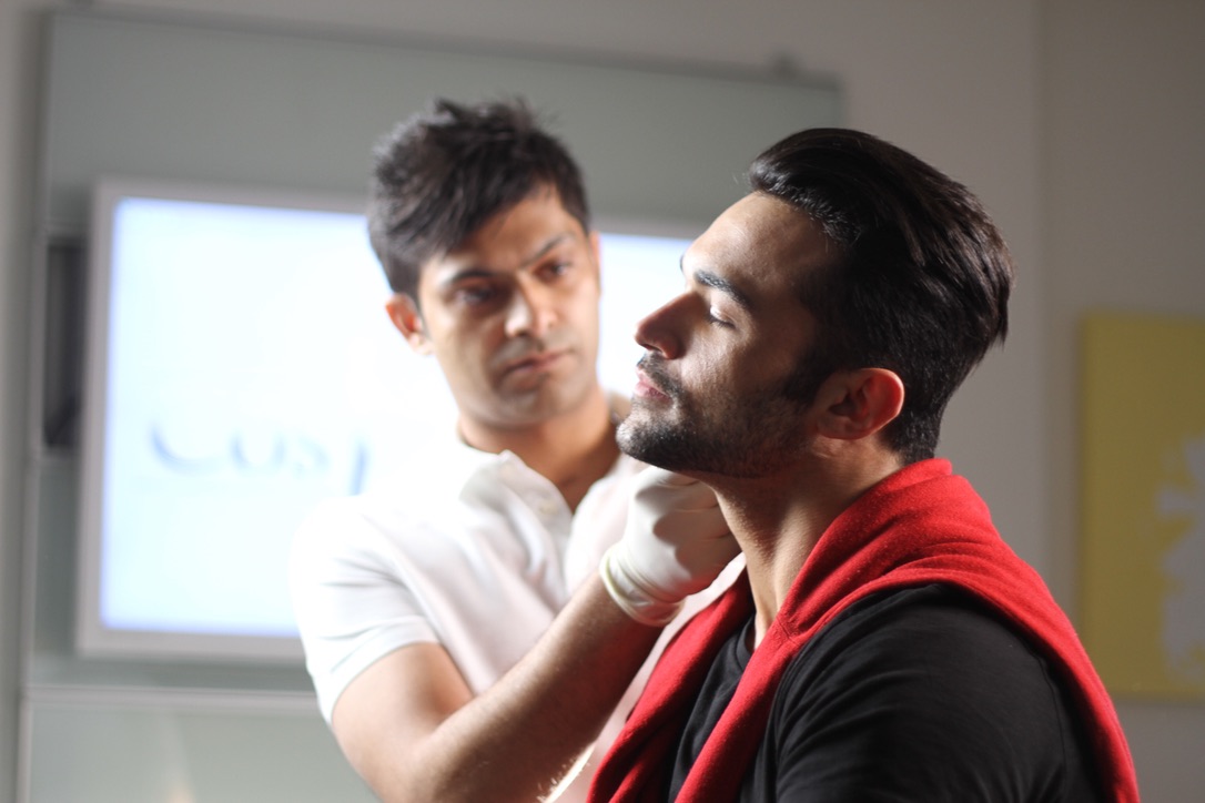 Aesthetic nurse training session at Harley Street Institute - hands-on botox course for nurses with instructor demonstrating injection technique