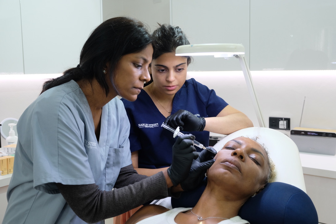 One-to-one Botox mentorship training at Harley Street with expert instructor guiding student during live patient treatment
