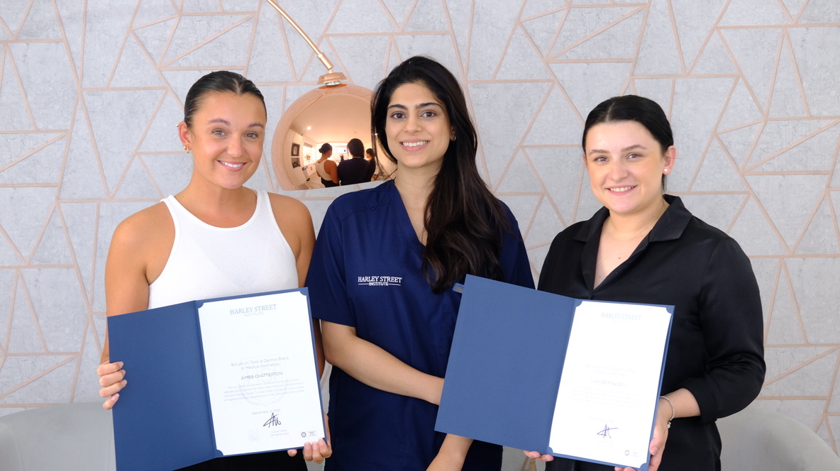 Medical students with certificates at Harley Street Institute